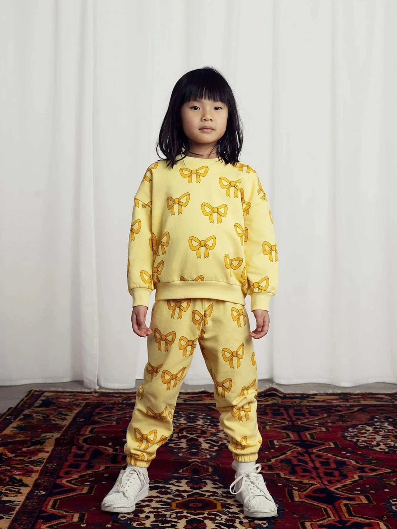 Mini Rodini Girls Bow Joggers in Yellow