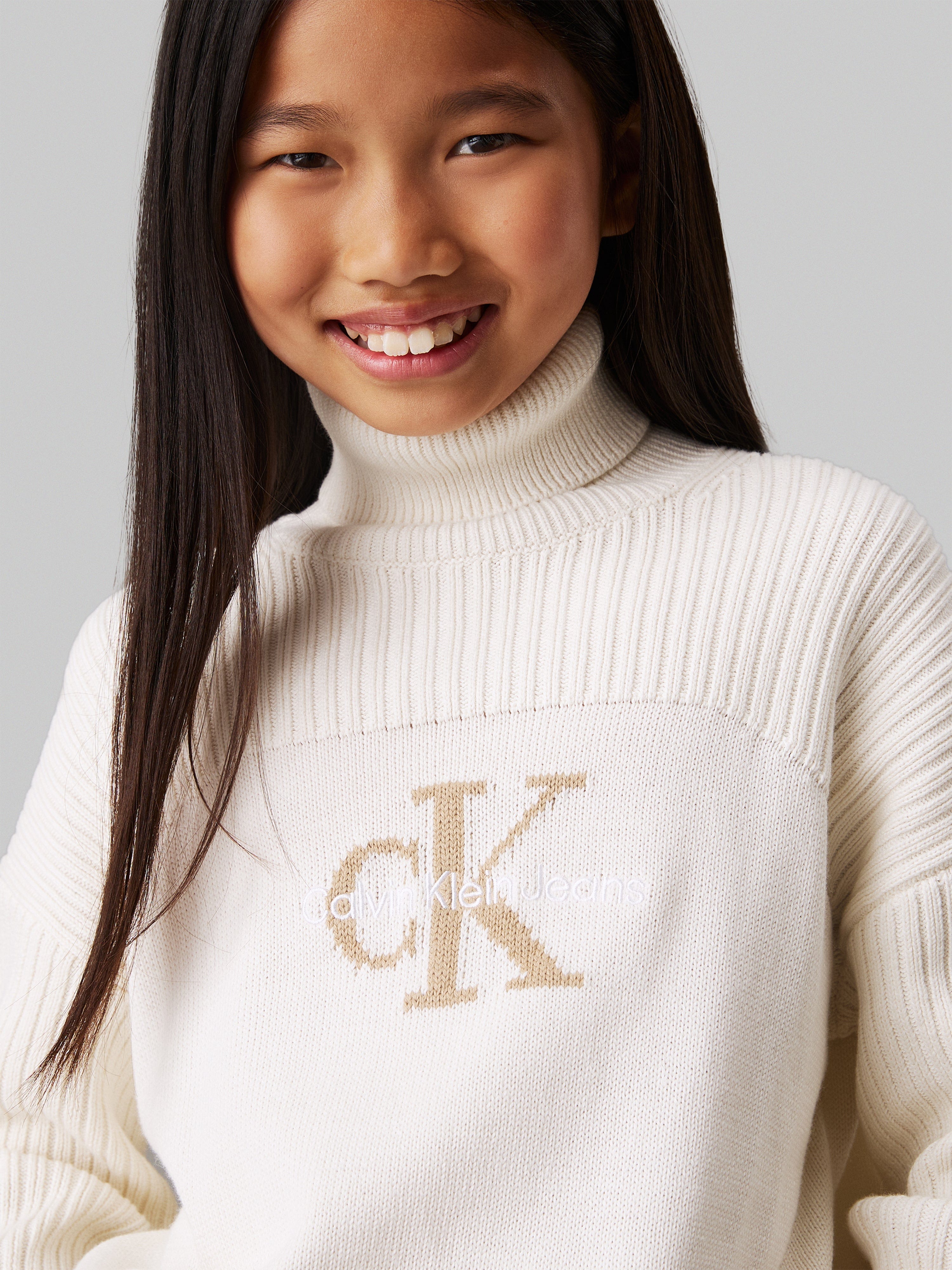 Calvin Klein Girls Logo Rollneck Sweater in Ivory