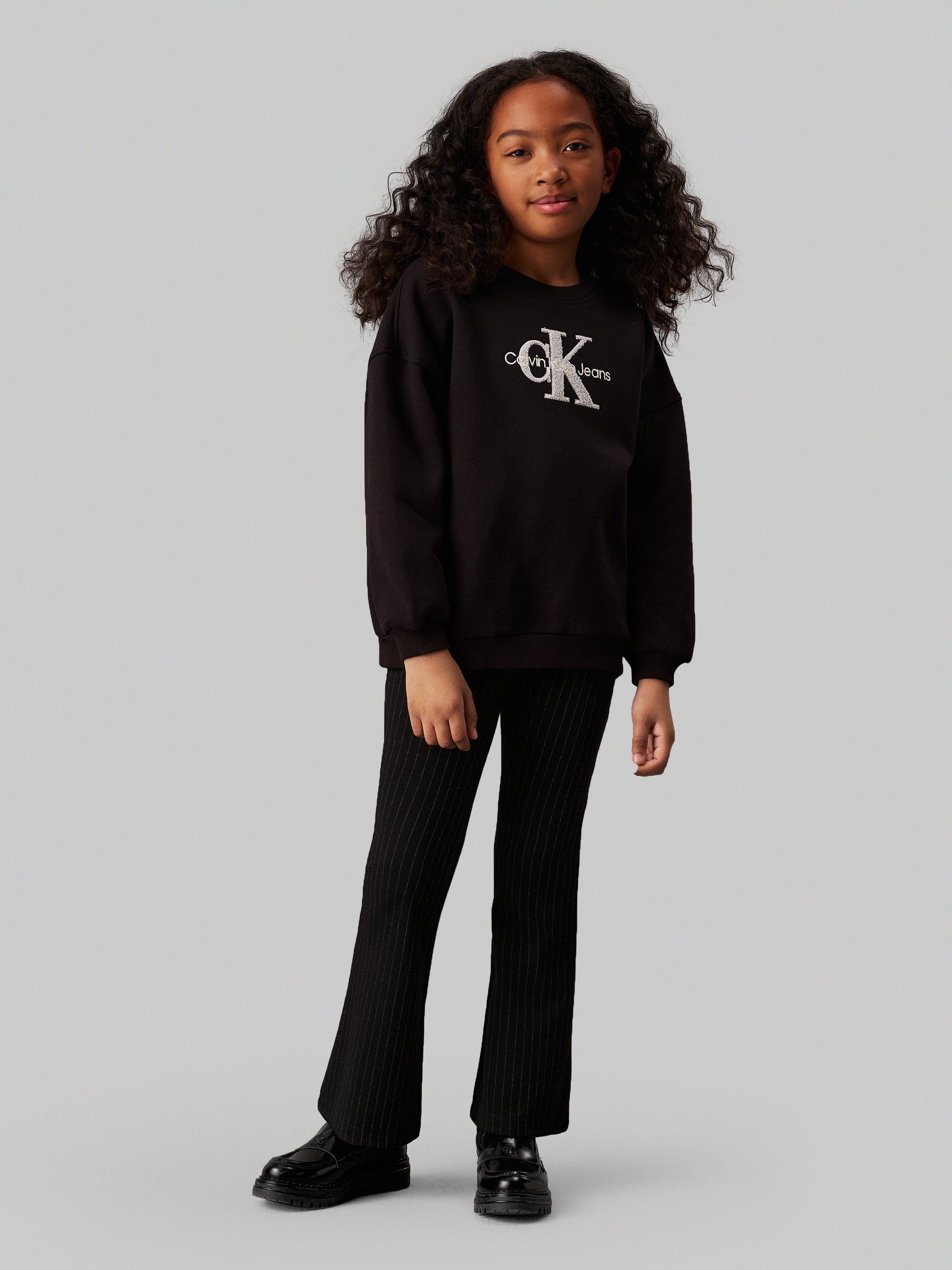Calvin Klein Girls Pinstripe Flare Trousers in Black