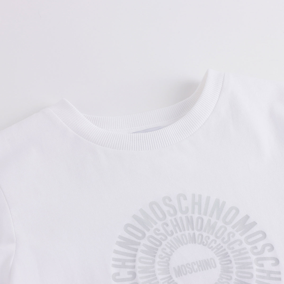 T-shirt en coton blanc avec logo circulaire pour garçons et filles