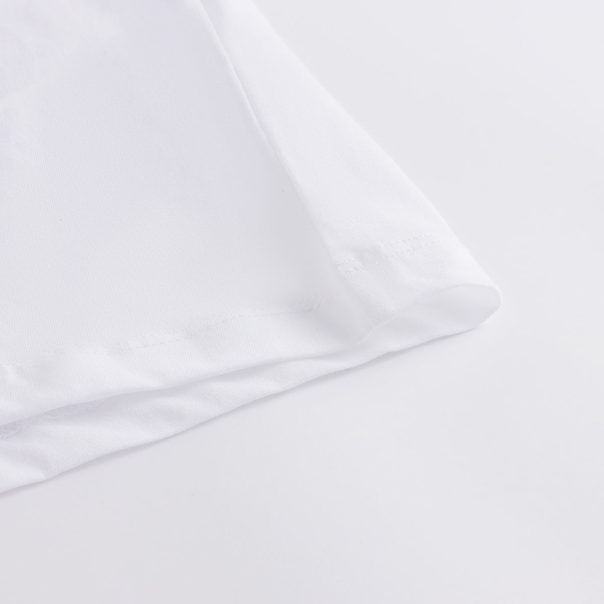 T-shirt en coton blanc avec logo circulaire pour garçons et filles