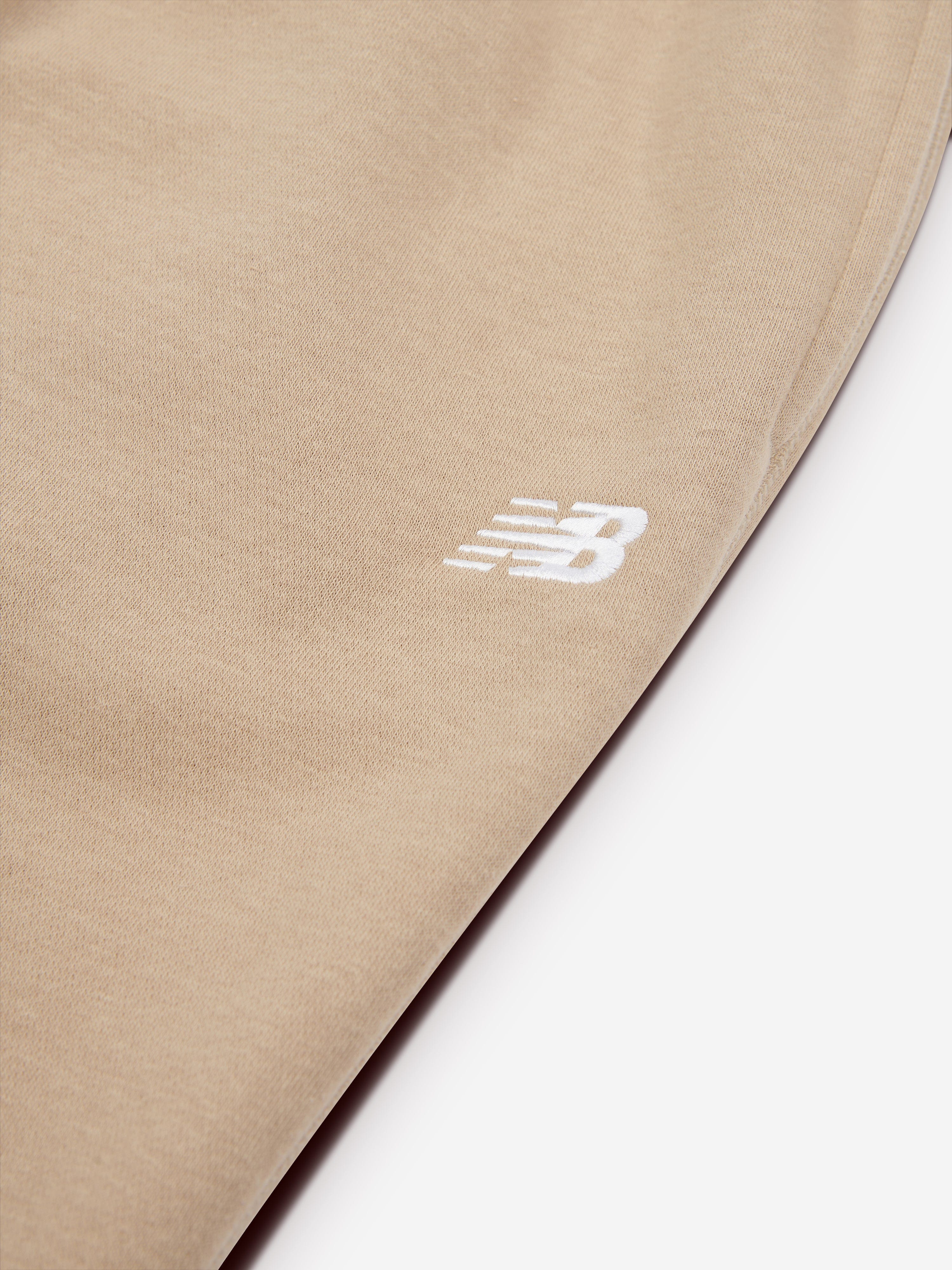 New Balance Boys Brush Back Small Logo Joggers in Beige