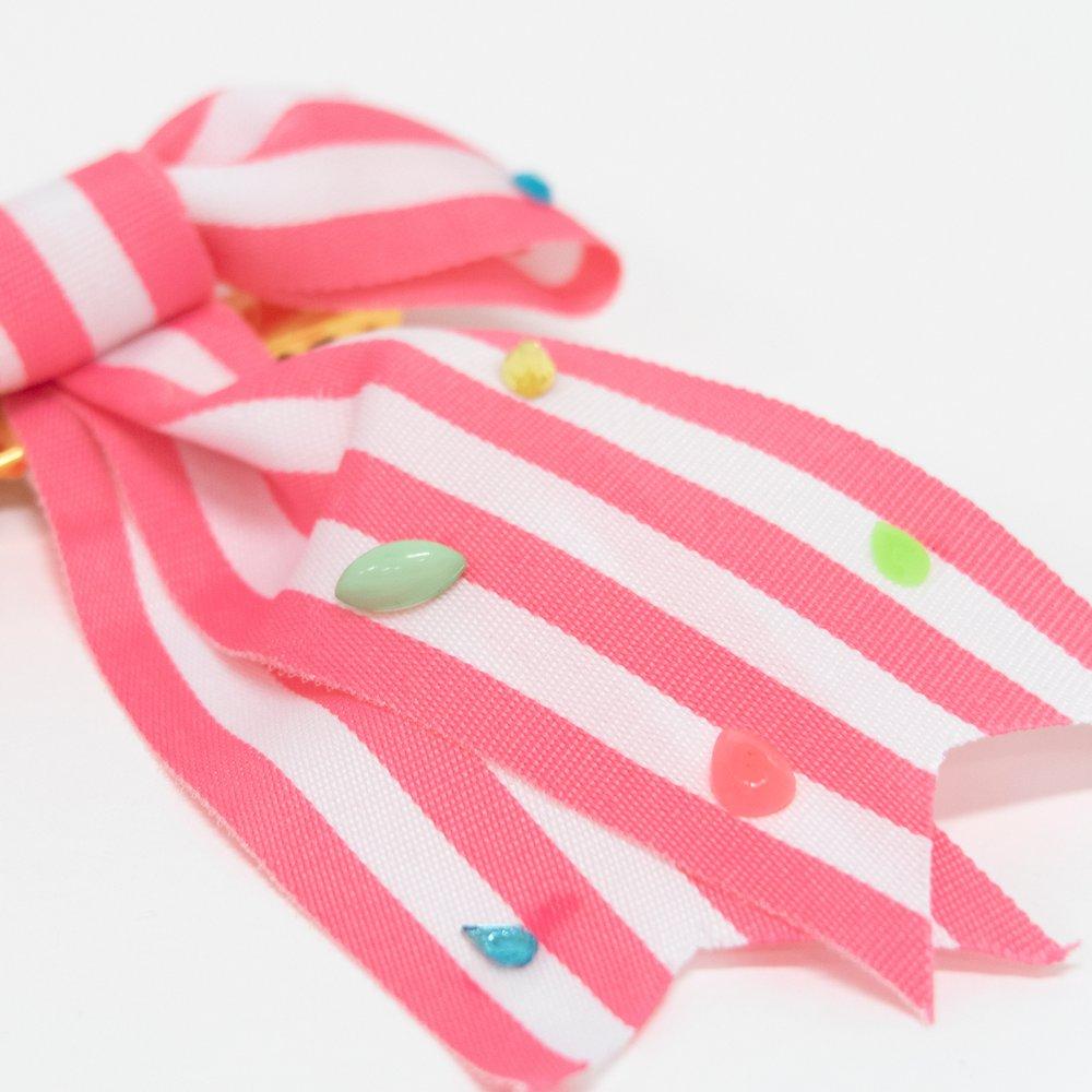 Barrette nœud rayée rose