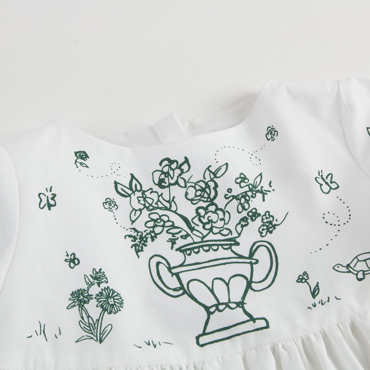 Robe Fille Bébé Blanche avec Imprimés Garnitures Jardin Botanique