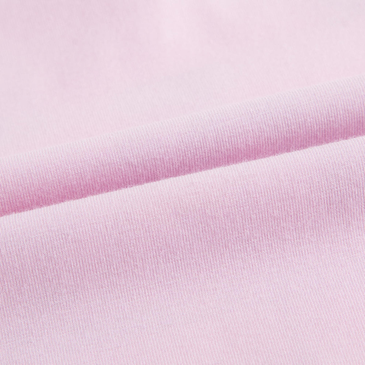Pyjama fille rose (haut) et blanc (bas)