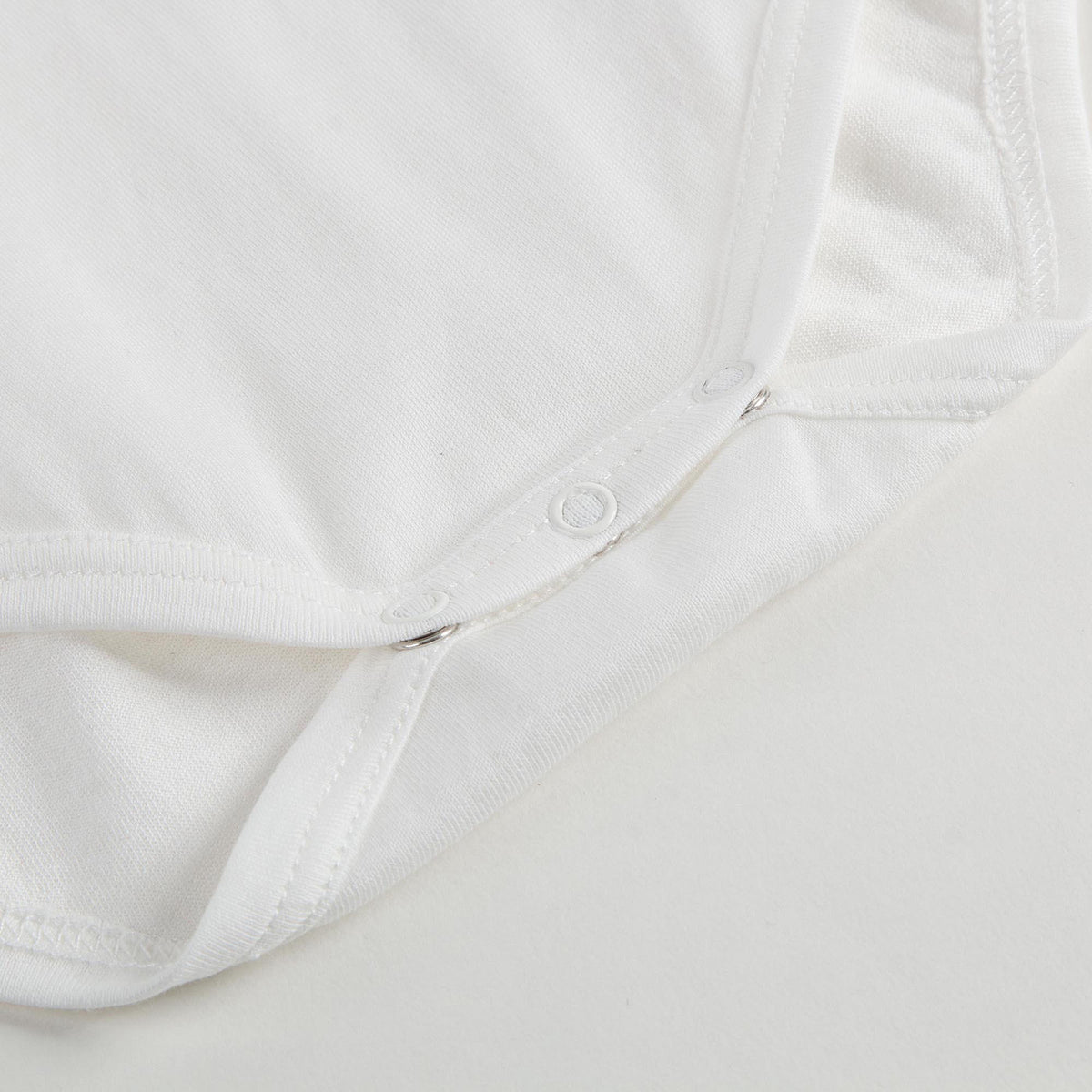 Body en coton blanc pour bébé fille avec col et finitions à patchs