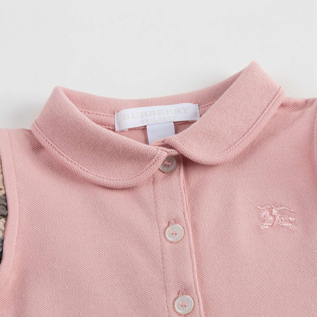 Polo rose clair avec volants à carreaux pour bébés filles