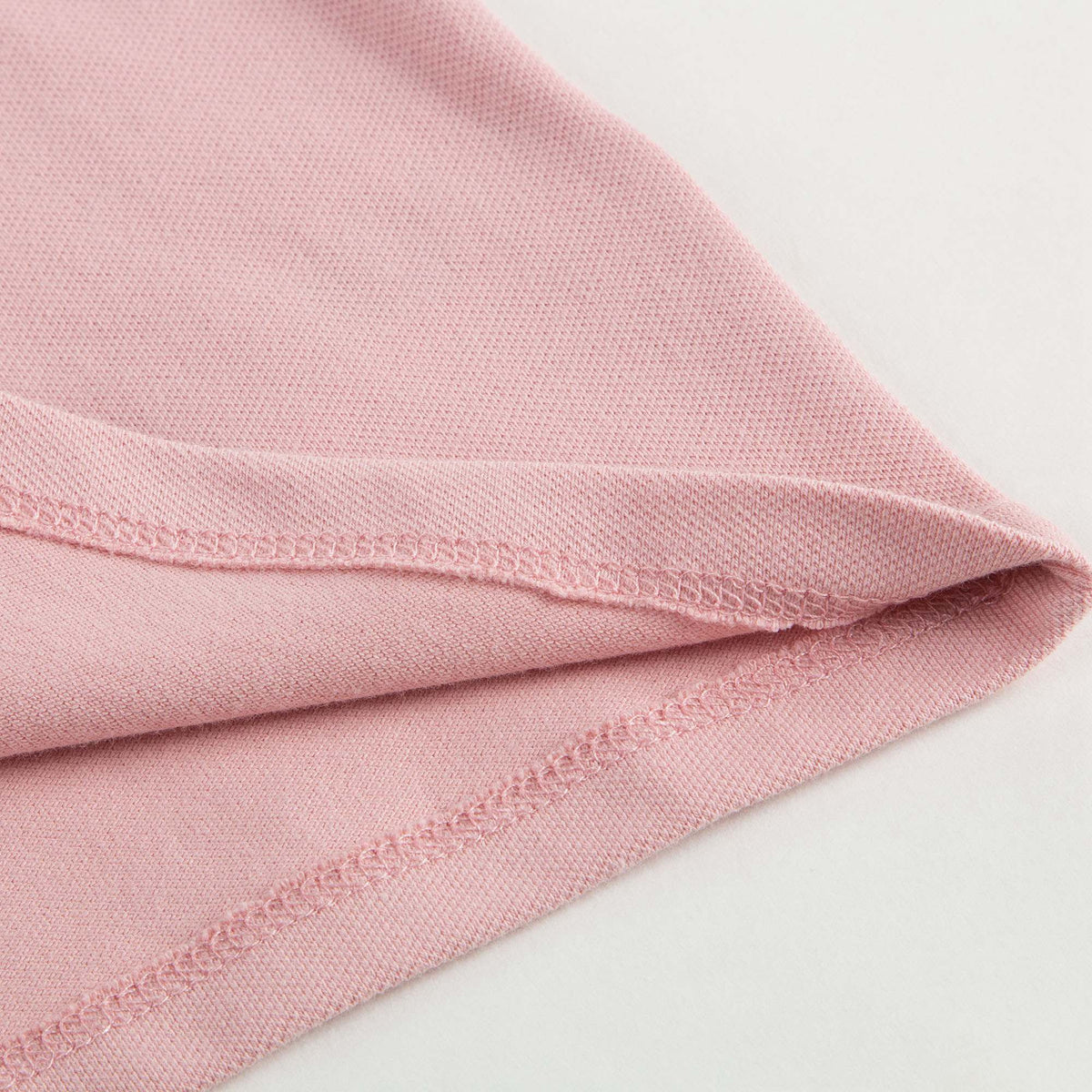 Polo rose clair avec volants à carreaux pour bébés filles