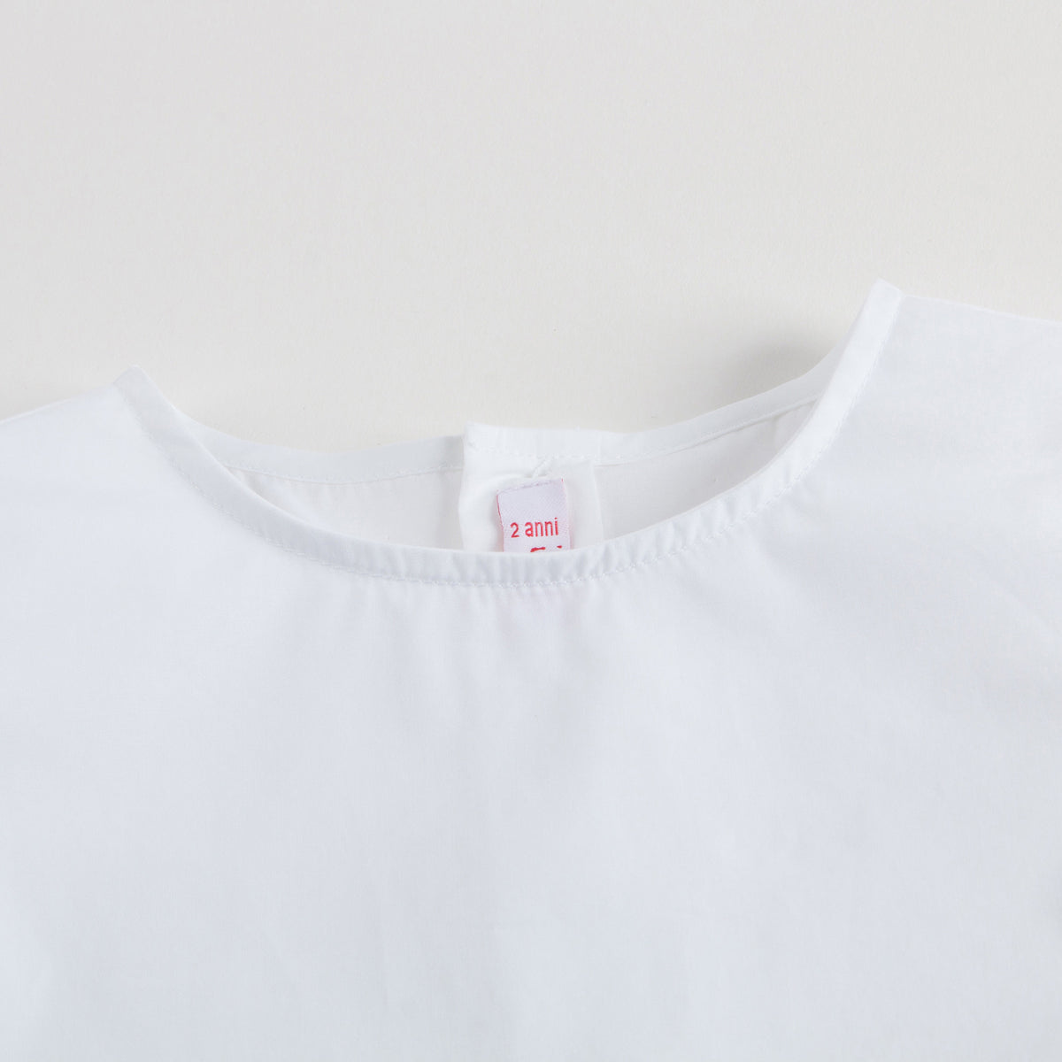 Haut blanc sans manches pour filles
