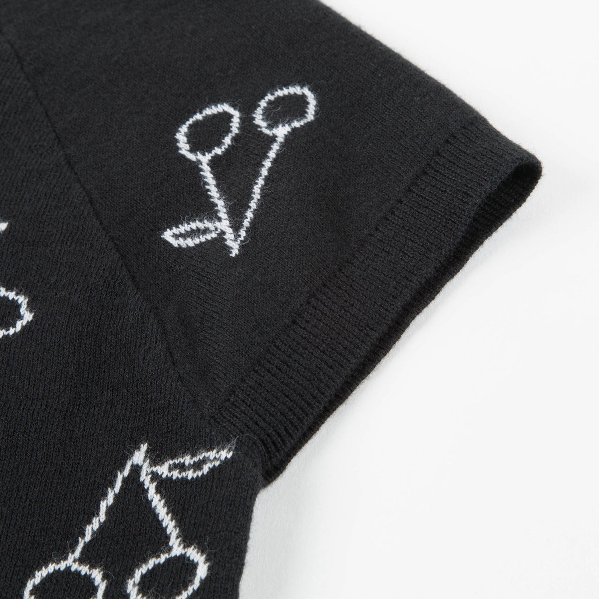 T-shirt en maille noir à imprimé cerises blanches pour fille