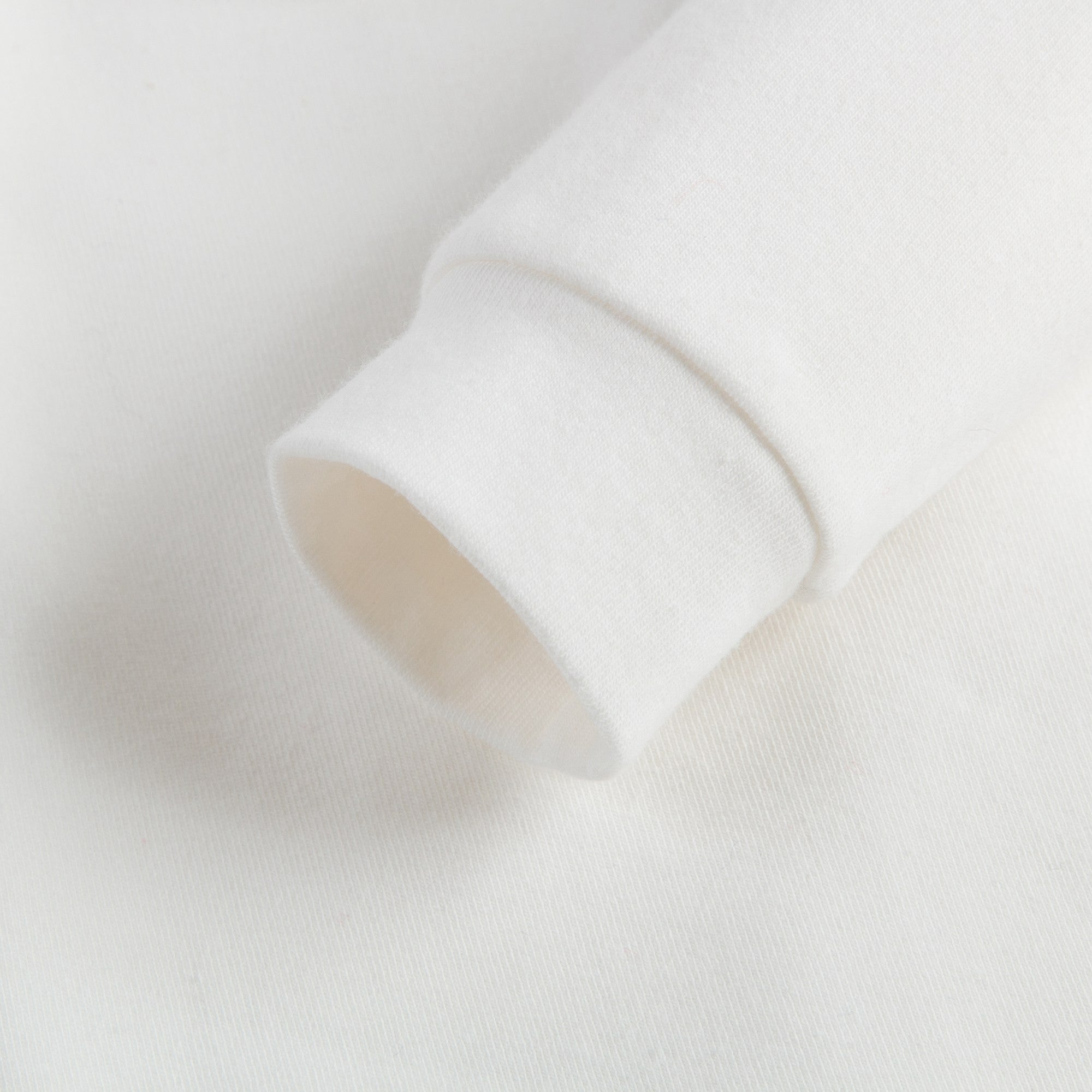 Baby Ivory Cotton Babysuit With Pom-Pom Trims