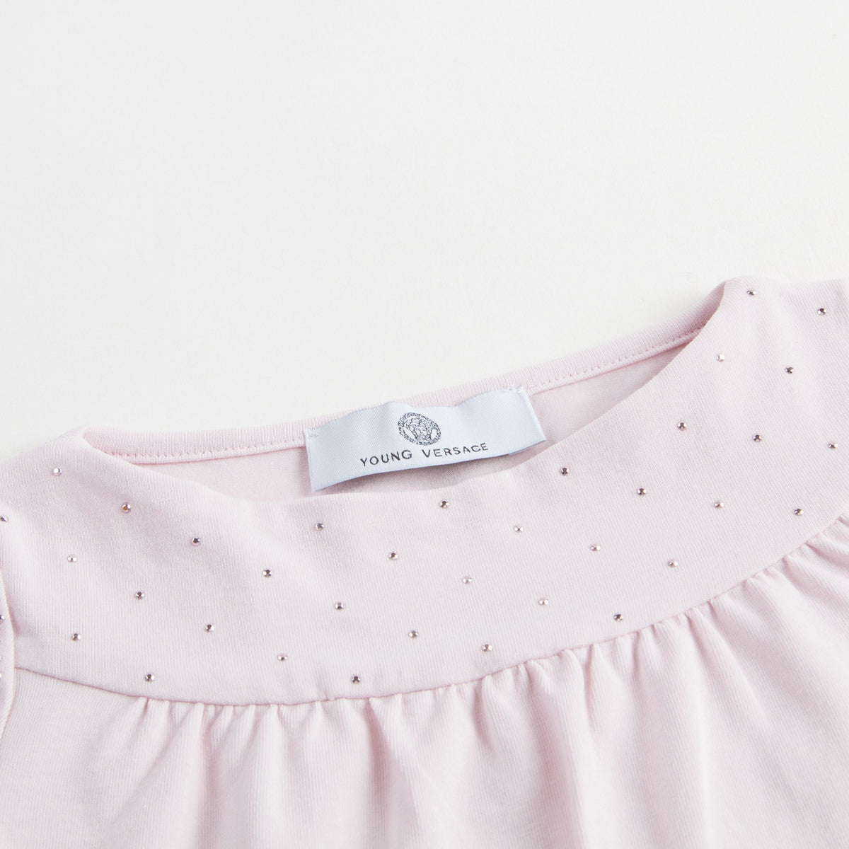 Chemisier rose en coton pour bébé fille avec finitions en strass dorés