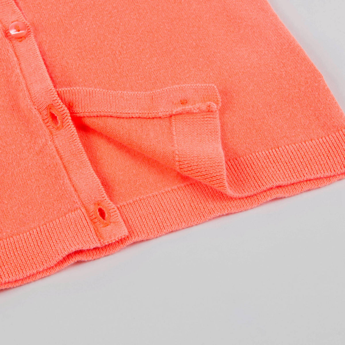 Cardigan en maille orange pour bébé fille