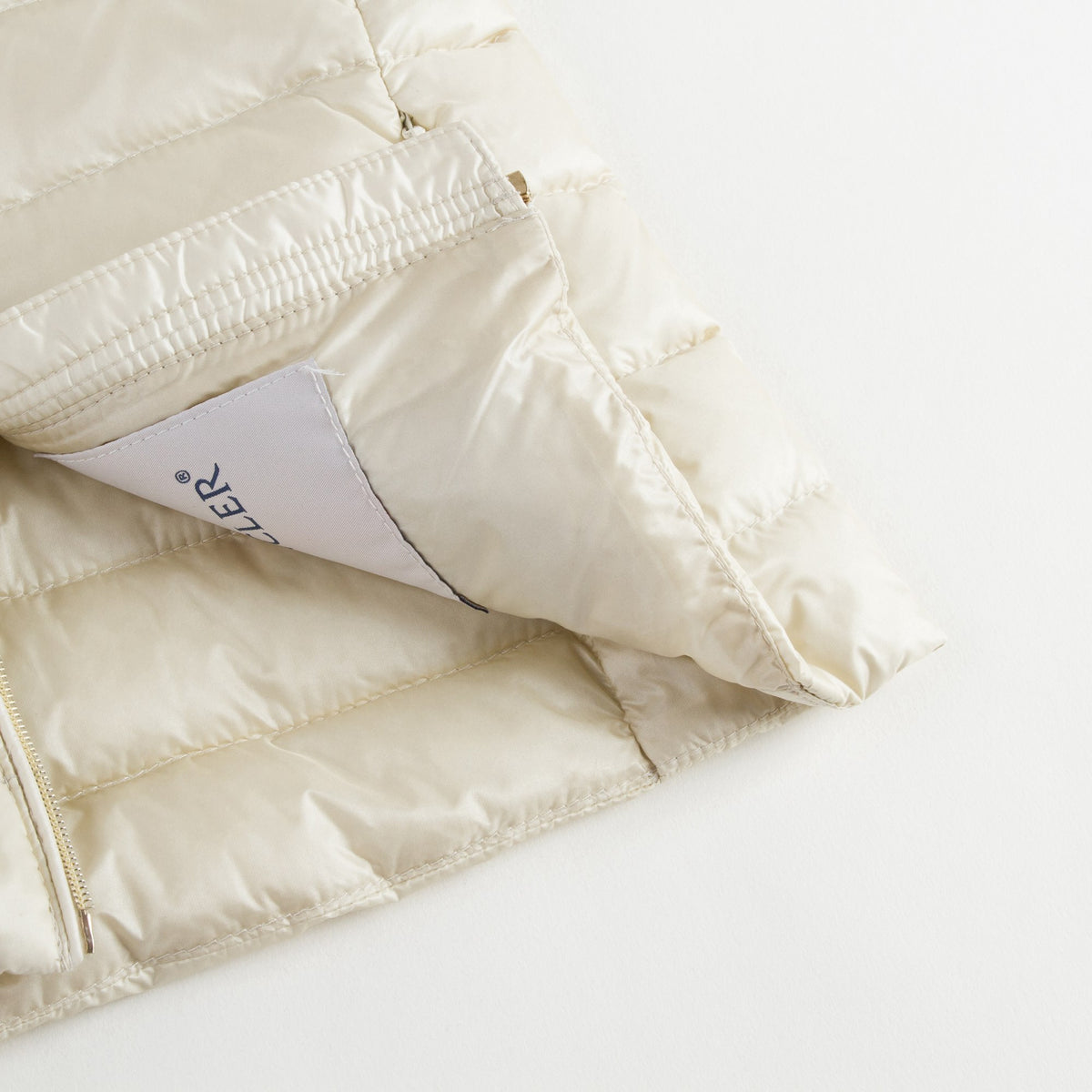 Doudoune matelassée à poche cachée blanc cassé « Ambrine » pour fille