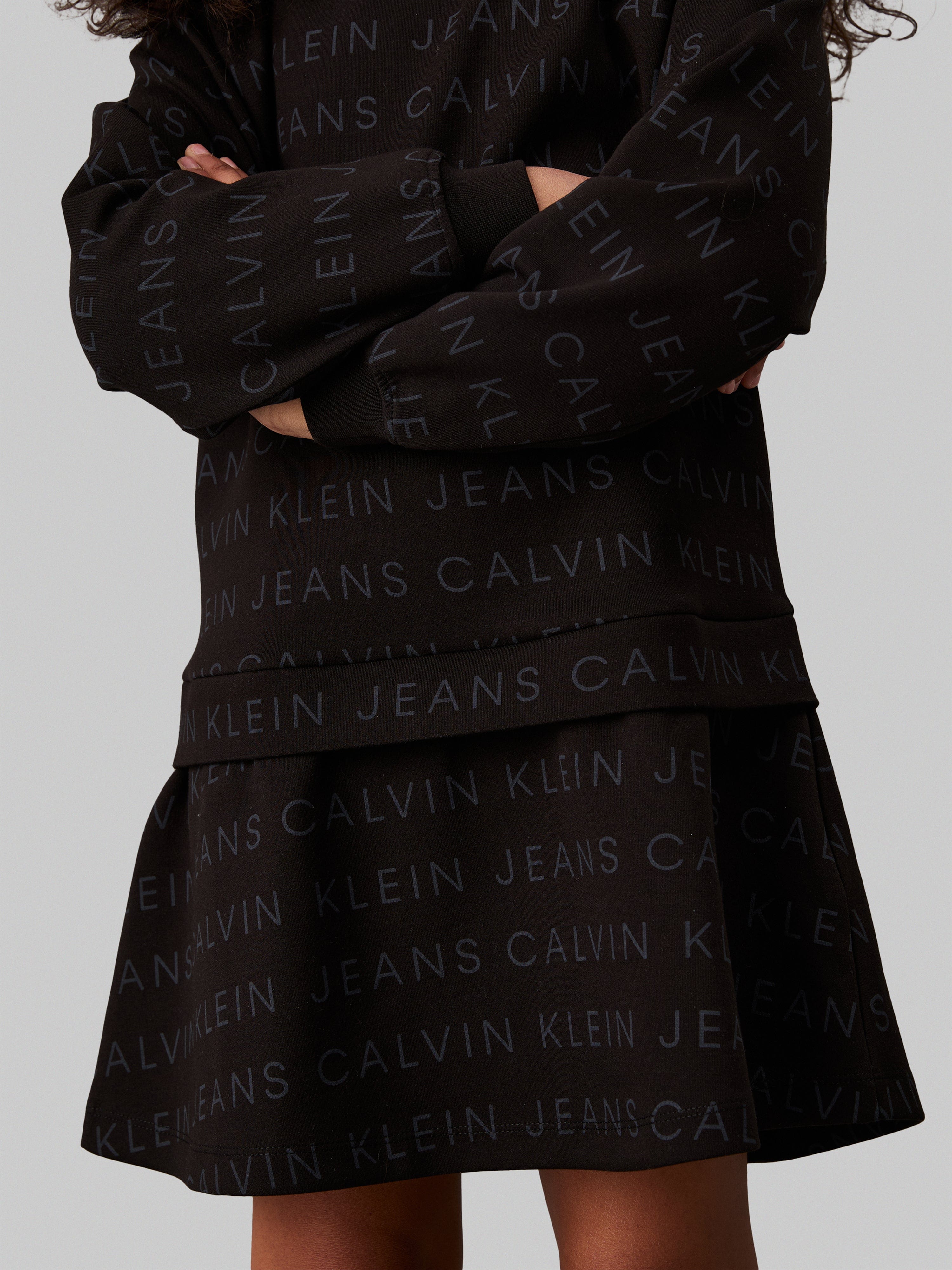Calvin Klein Girls Logo AOP Fleece Dress in Black