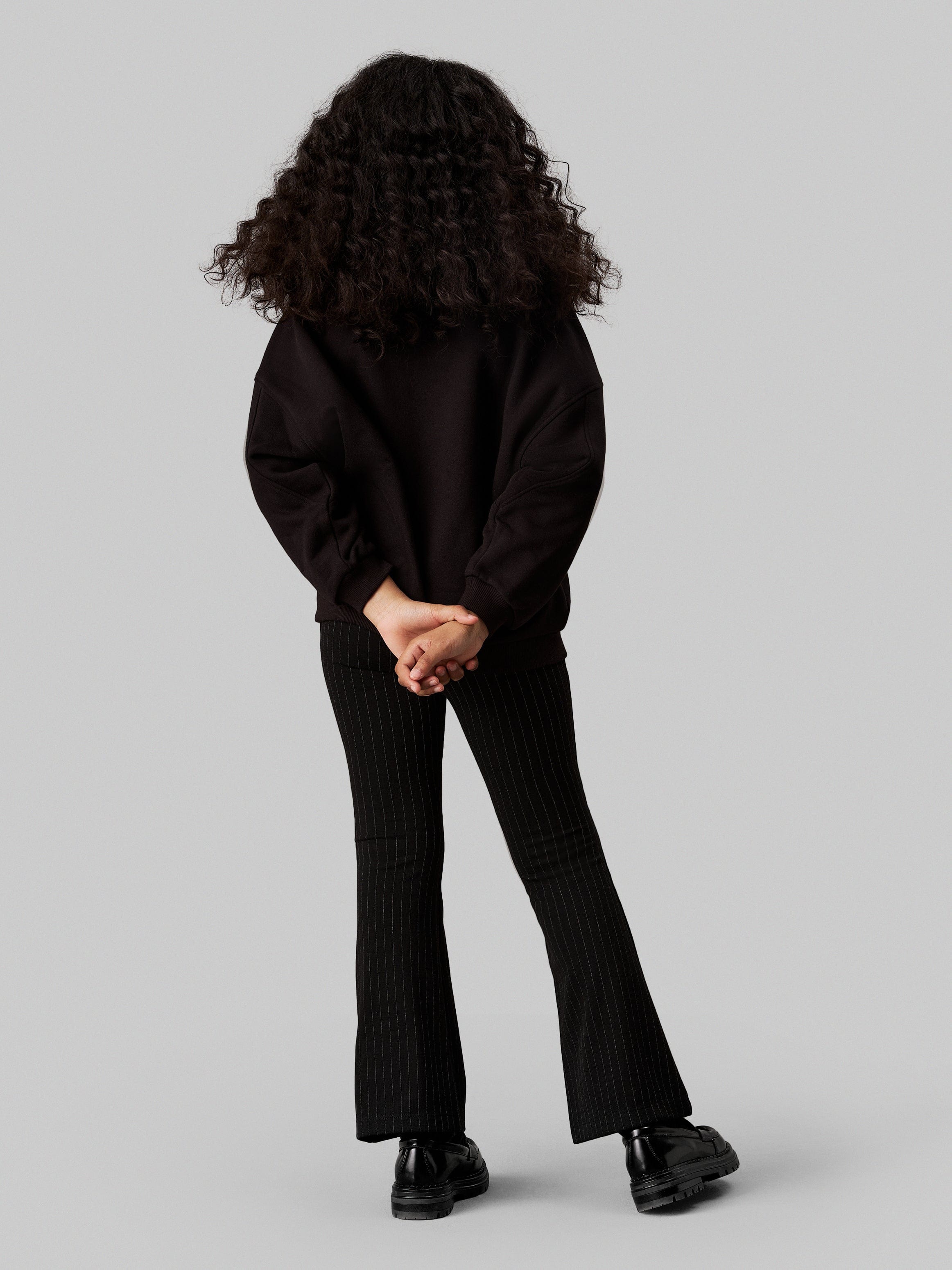 Calvin Klein Girls Pinstripe Flare Trousers in Black