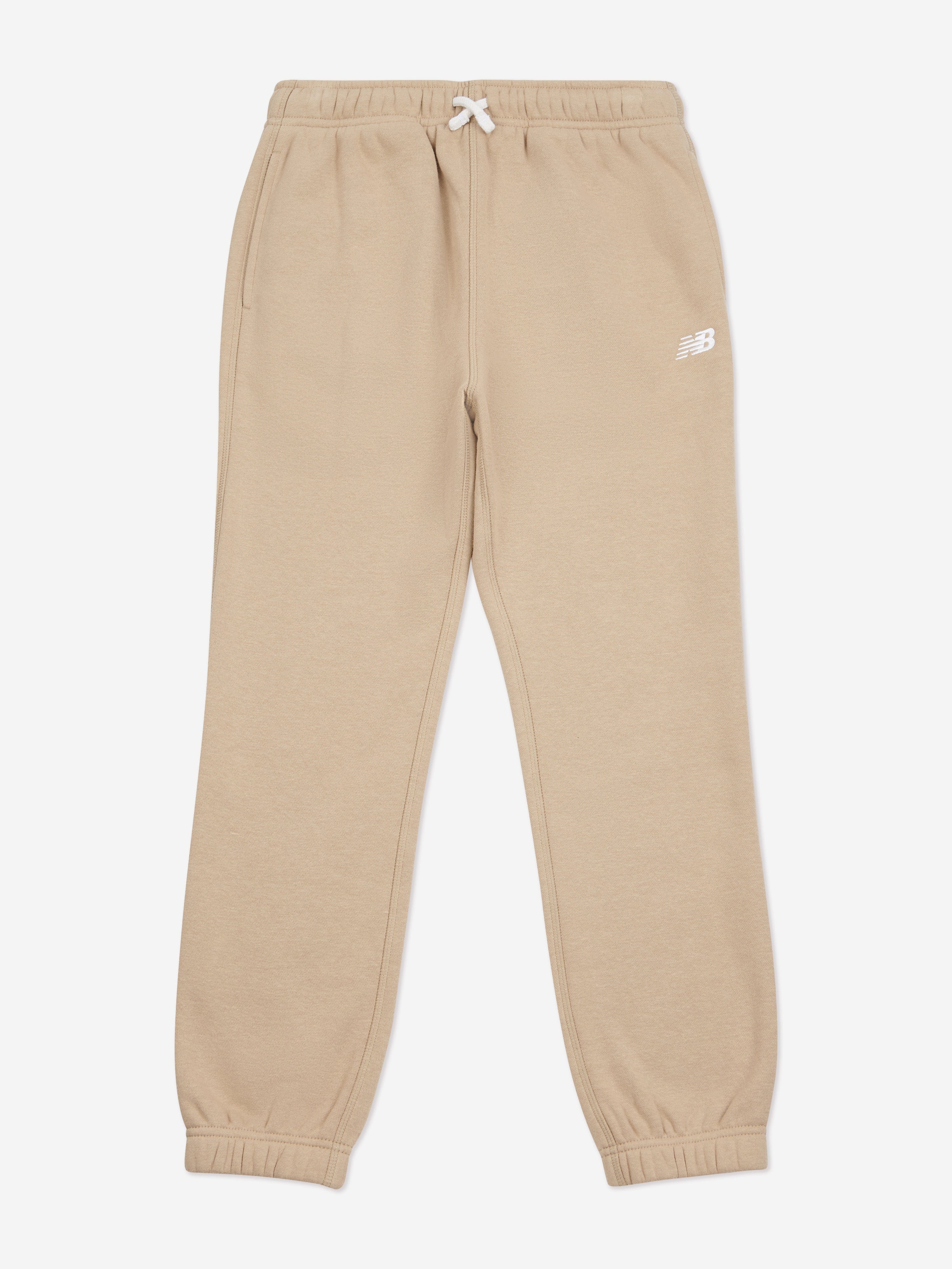 New Balance Boys Brush Back Small Logo Joggers in Beige