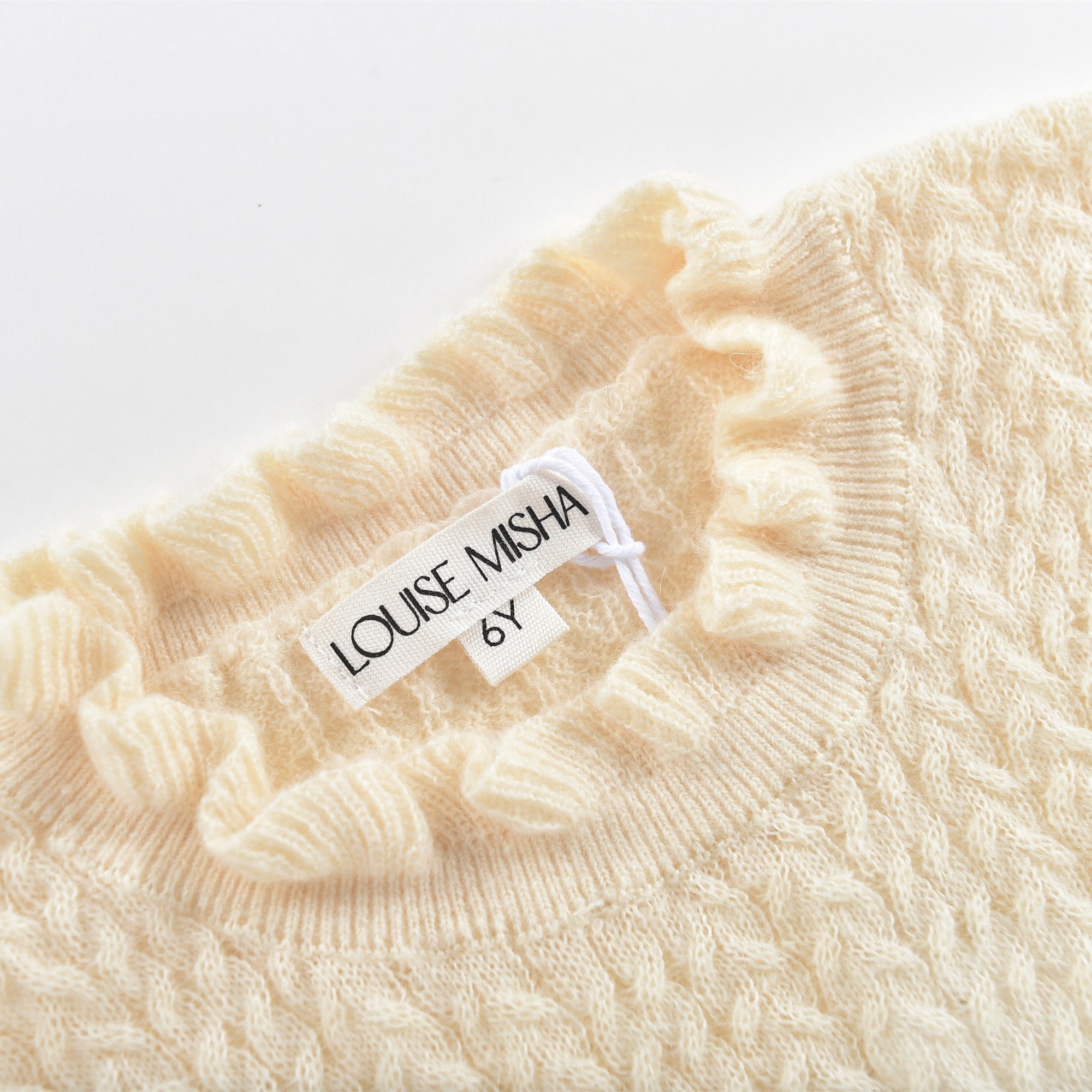 Girls White Ruffle Sweater