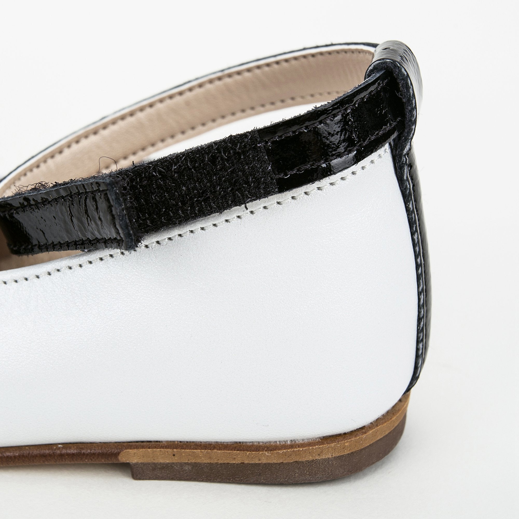 Girls White Suede Ballerinas With Black Patch Camelia Flower Embellished