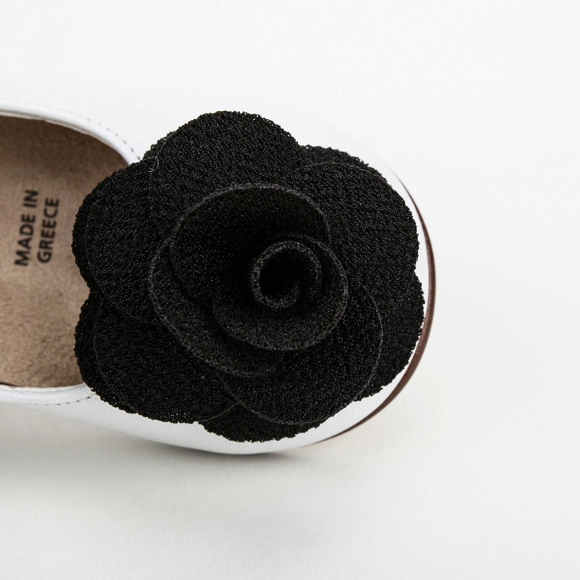 Girls White Suede Ballerinas With Black Patch Camelia Flower Embellished