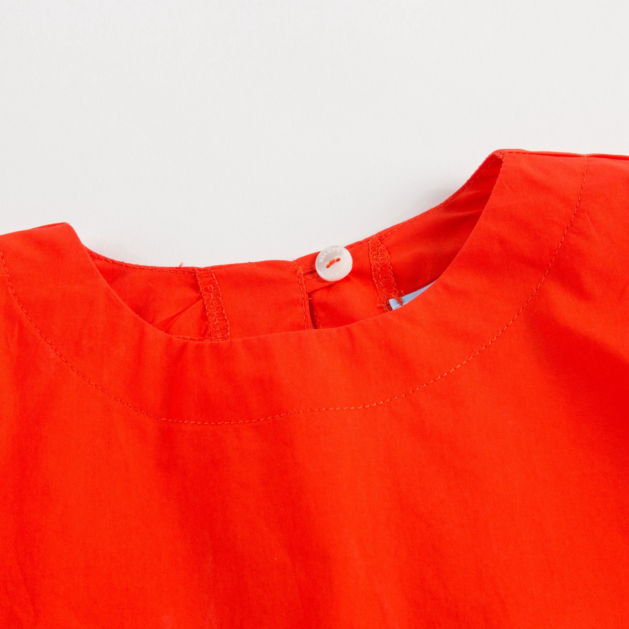 Girls Orange Cotton Top With Flounces
