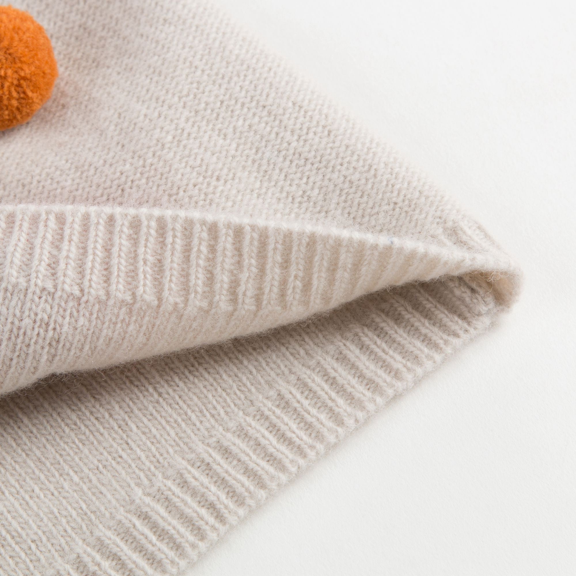 Girls Beige Wool Sweater With Pom-Pom Trims